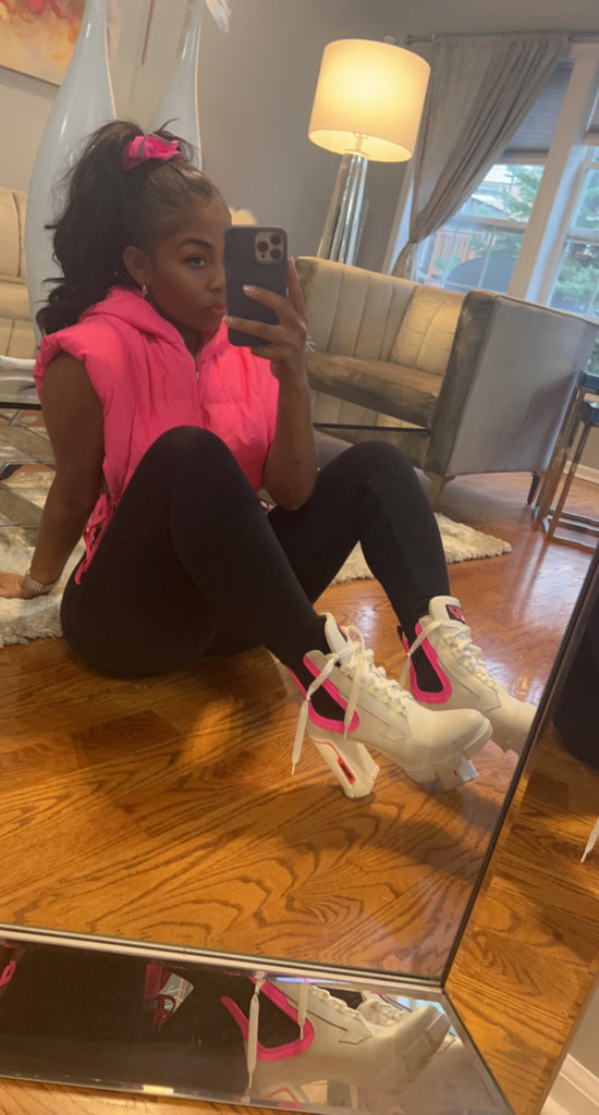 Pink puffy vest